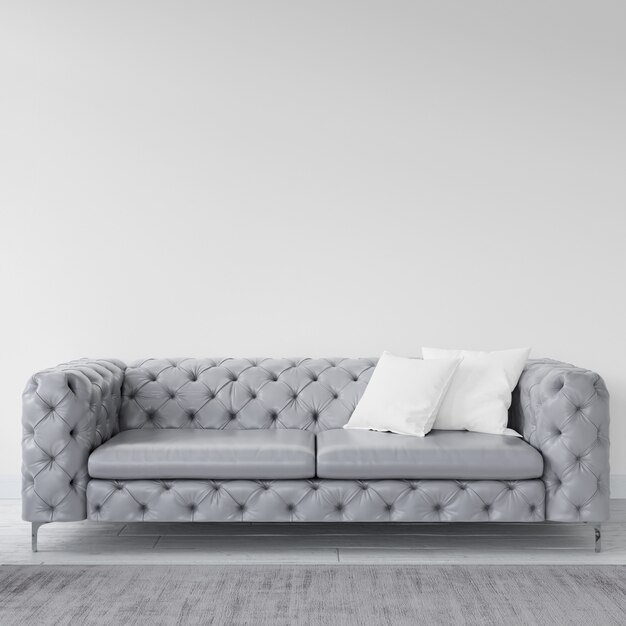 Empty wall with elegant sofa
