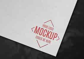 Free PSD engraved logo on paper mockup