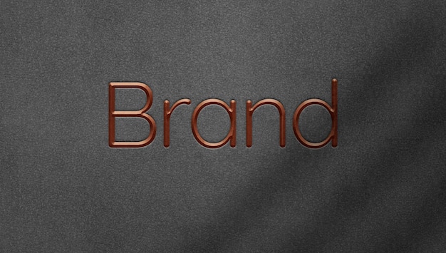 Free PSD engraved metallic logo on felt background