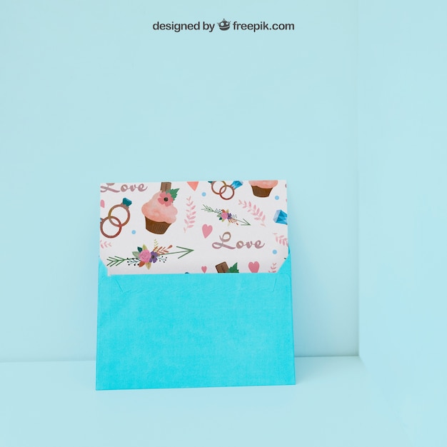 Free PSD envelope and card leaning against wall