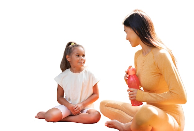 Free PSD female yoga instructor doing meditation with young girl