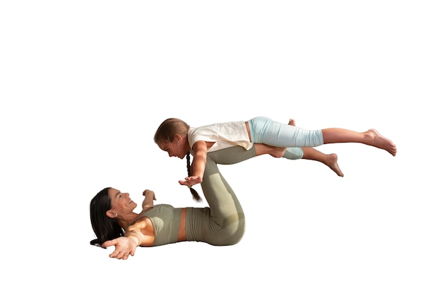 Free PSD female yoga instructor doing meditation with young girl