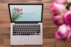 Free PSD floral laptop mockup