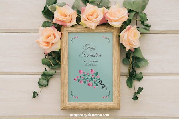 Free PSD flowers and leaves around wooden frame
