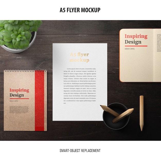 Free PSD flyer mockup in a desktop