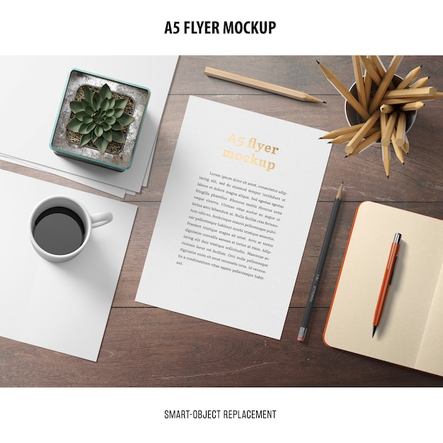 Free PSD flyer mockup in a desktop