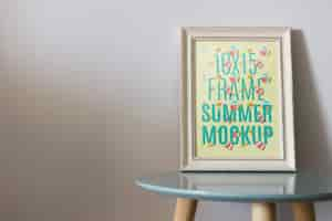 Free PSD frame mockup on table