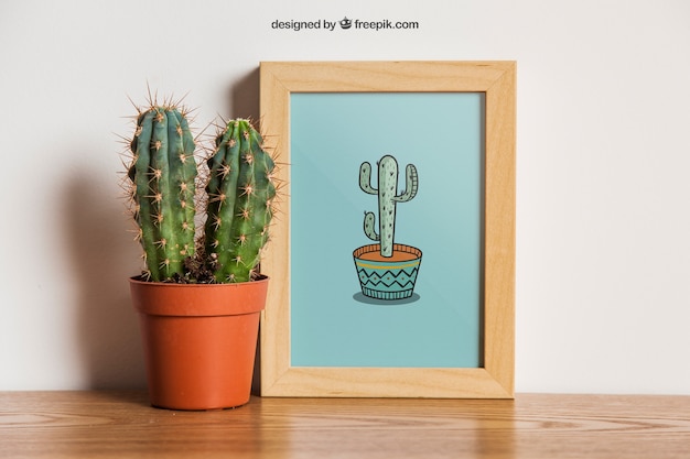 Free PSD frame mockup with cactus