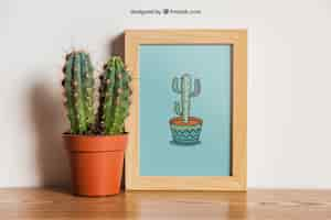 Free PSD frame mockup with cactus