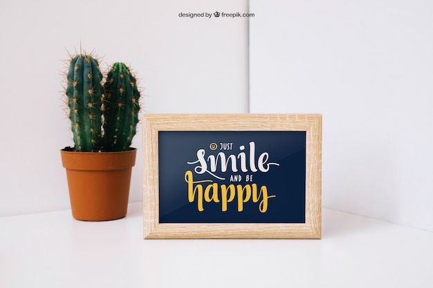 Free PSD frame mockup with cactus