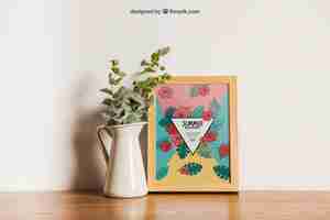 Free PSD frame mockup with flower decoration