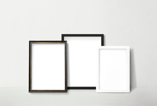 Frames leaning against a wall