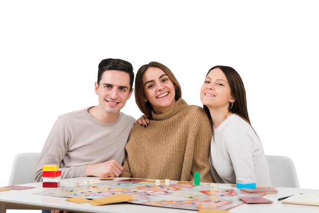 Friends playing card games isolated