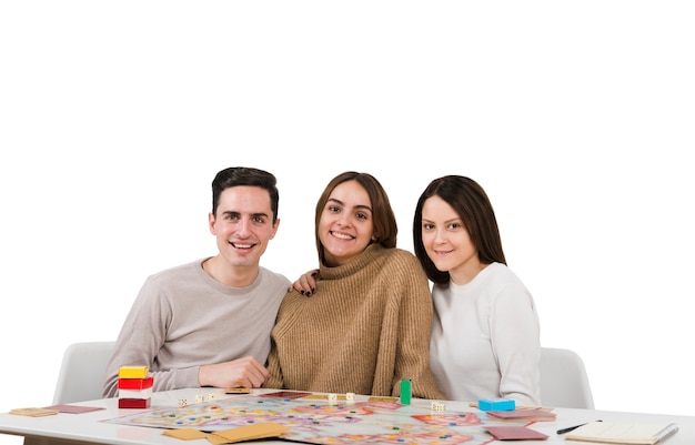 Friends playing card games isolated