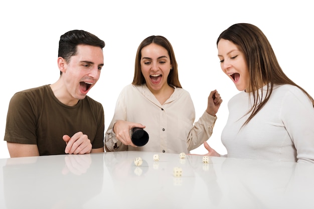 friends playing card games isolated
