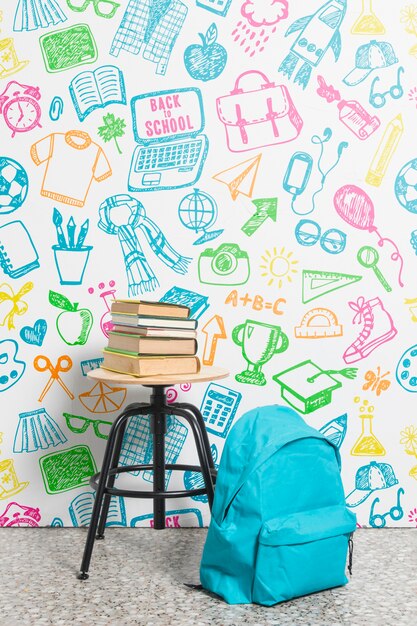 Front view backpack with pile of books