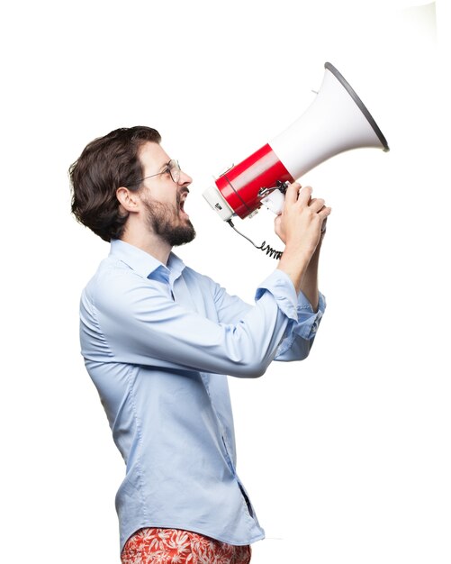 Furious businessman using a bullhorn