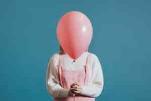 Free PSD girl with a pink helium balloon