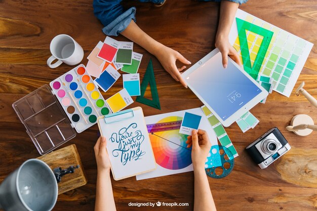 Graphic designer mockup with hands