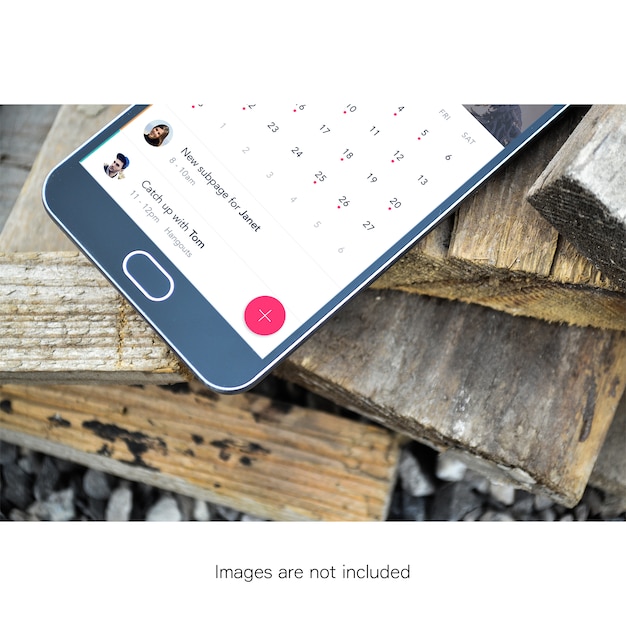 Free PSD half mobile phone screen on wood mock up