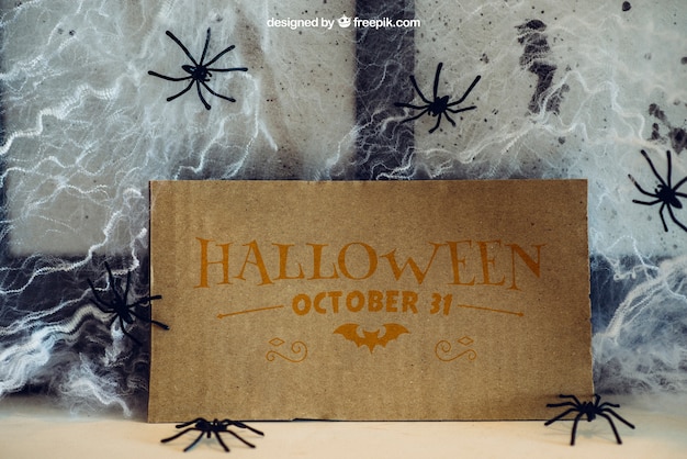 Halloween mockup with cardboard and cobweb