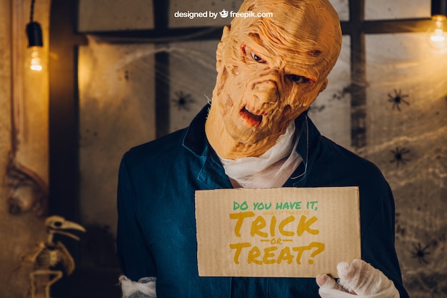 Halloween mockup with monster showing cardboard