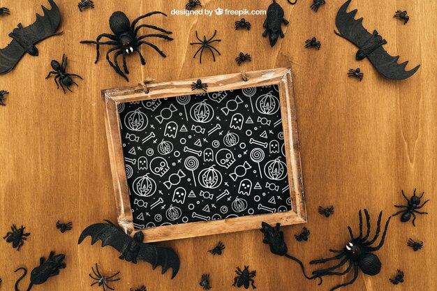 Halloween mockup with slate and insects