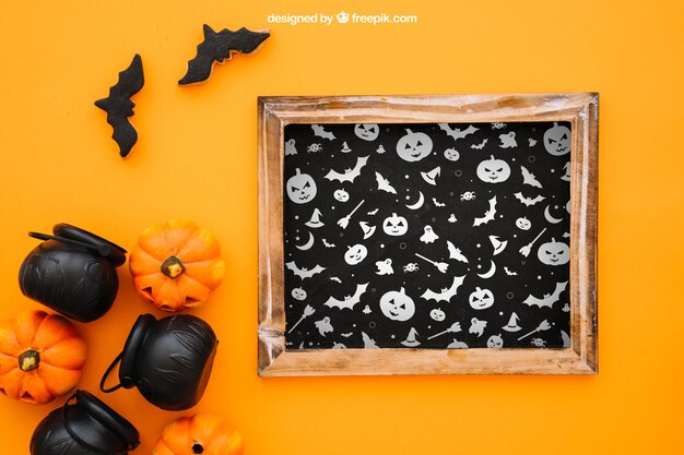 Halloween mockup with slate and pumpkins