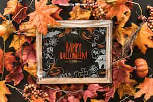 Free PSD halloween slate mockup on leaves