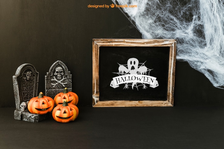 Free PSD halloween slate mockup with pumpkins on tombstones