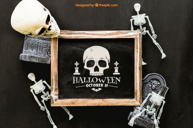 Free PSD halloween slate mockup with skeletons