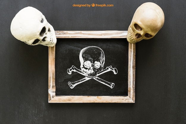 Free PSD halloween slate mockup with two skulls