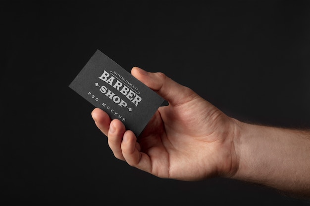 Hand Holding Embossed Business Card