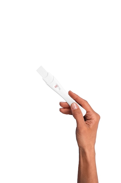 Бесплатный PSD Рука держит положительный тест на беременность