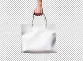 Free PSD hand holding white leather bag isolated on background