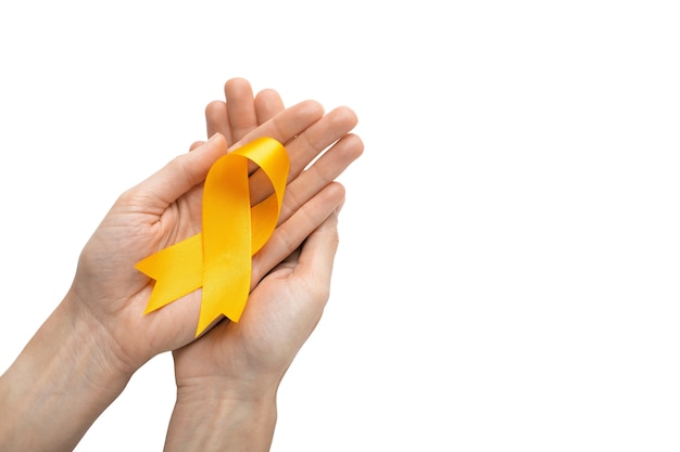 Free PSD hand with yellow ribbon