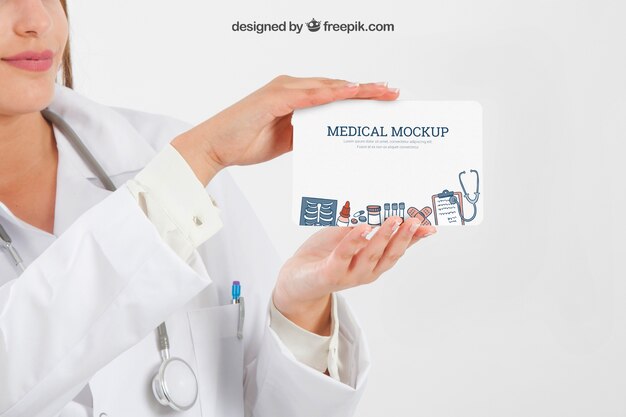 Hands holding medical mock up