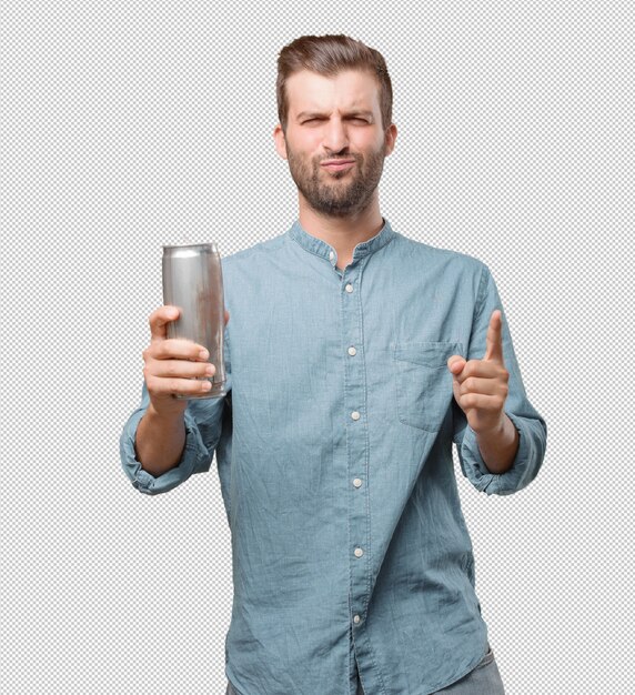 Handsome young man with can