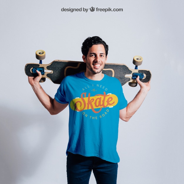 Happy skater posing with skateboard free PSD download