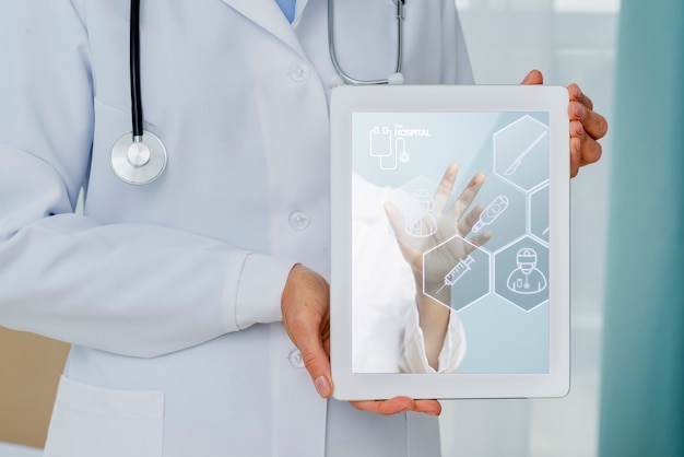 Health tablet held by doctor close-up