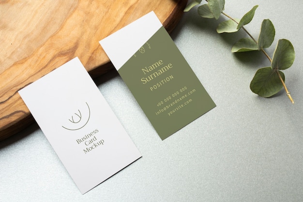 High angle business cards and plant