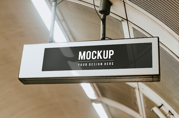 Indoor board mockup hanging from a ceiling