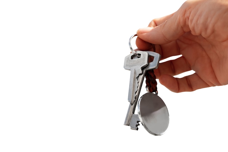 Free PSD keys held in hand isolated