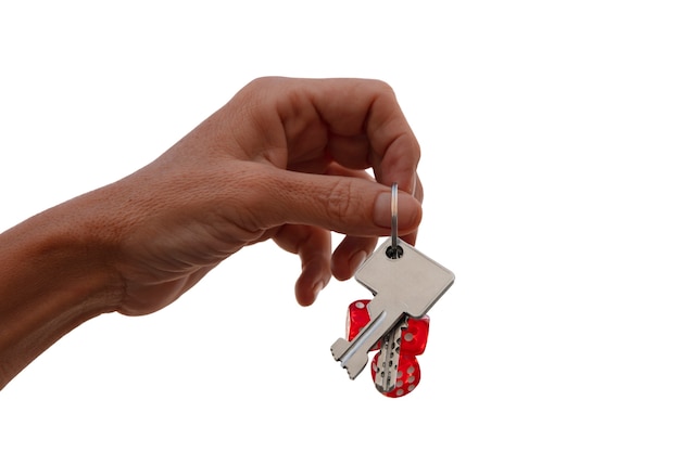 Keys held in hand isolated