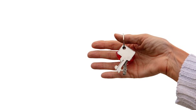 Keys held in hand isolated