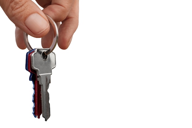 Keys held in hand isolated