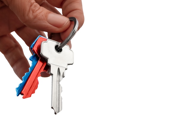 Keys held in hand isolated