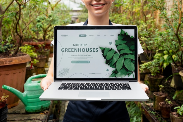 Laptop mockup in a greenhouse