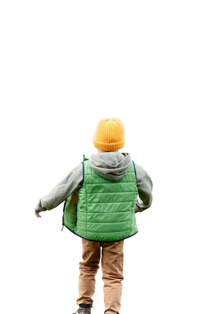 Little boy spending time outdoors in the grass