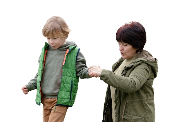 Little boy spending time outdoors with his grandmother